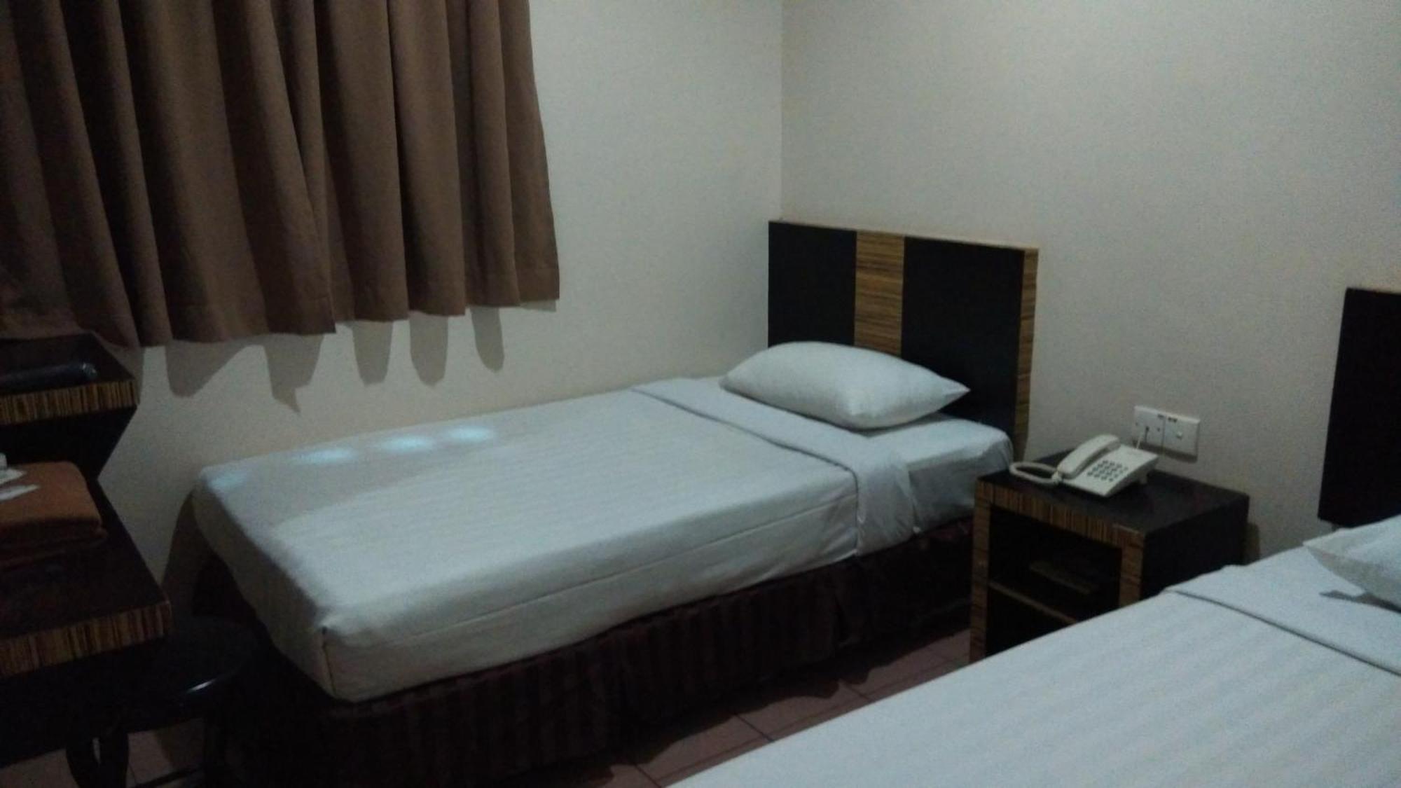 Hotel Traveller Kota Kinabalu Rom bilde