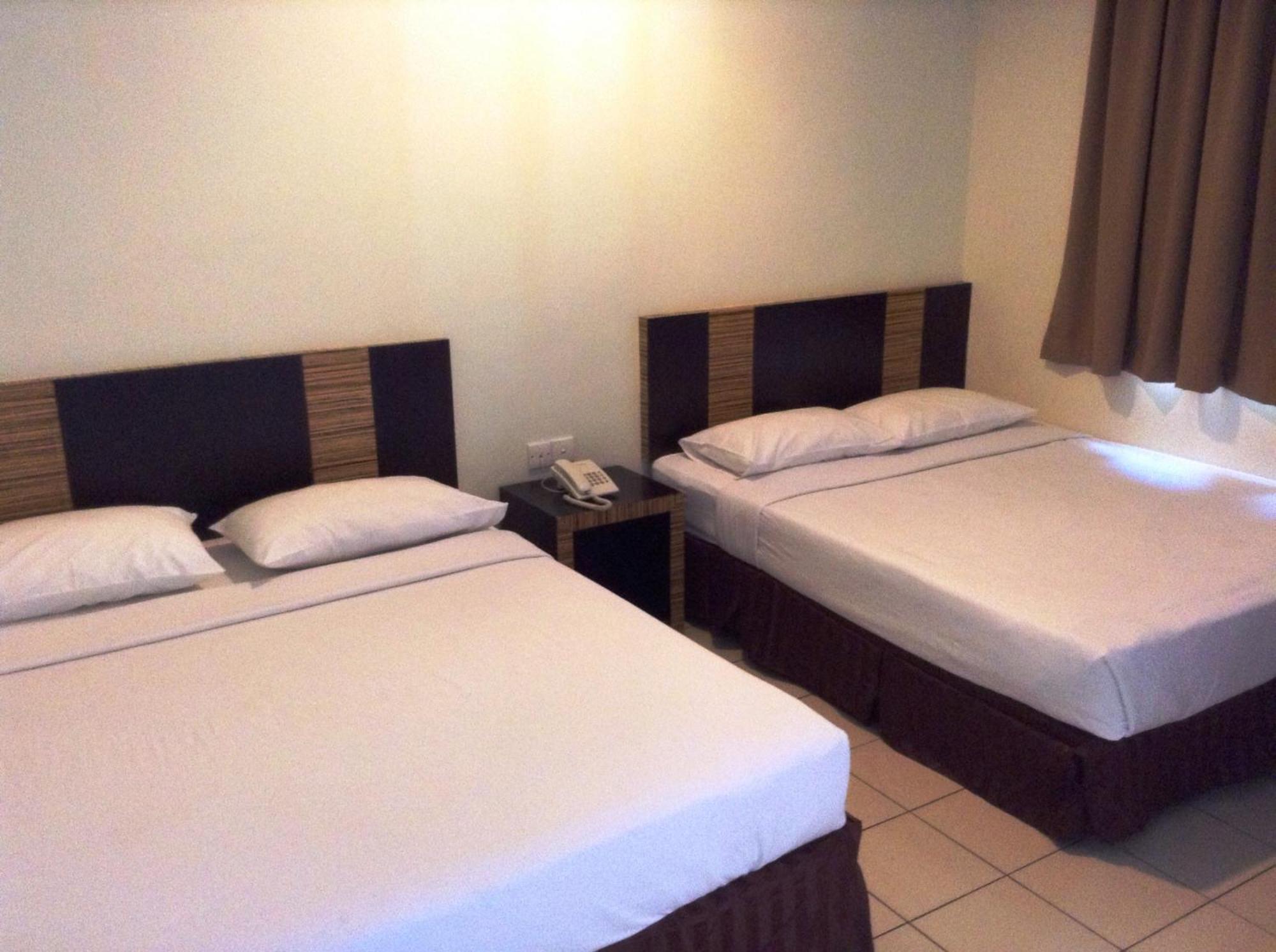 Hotel Traveller Kota Kinabalu Rom bilde