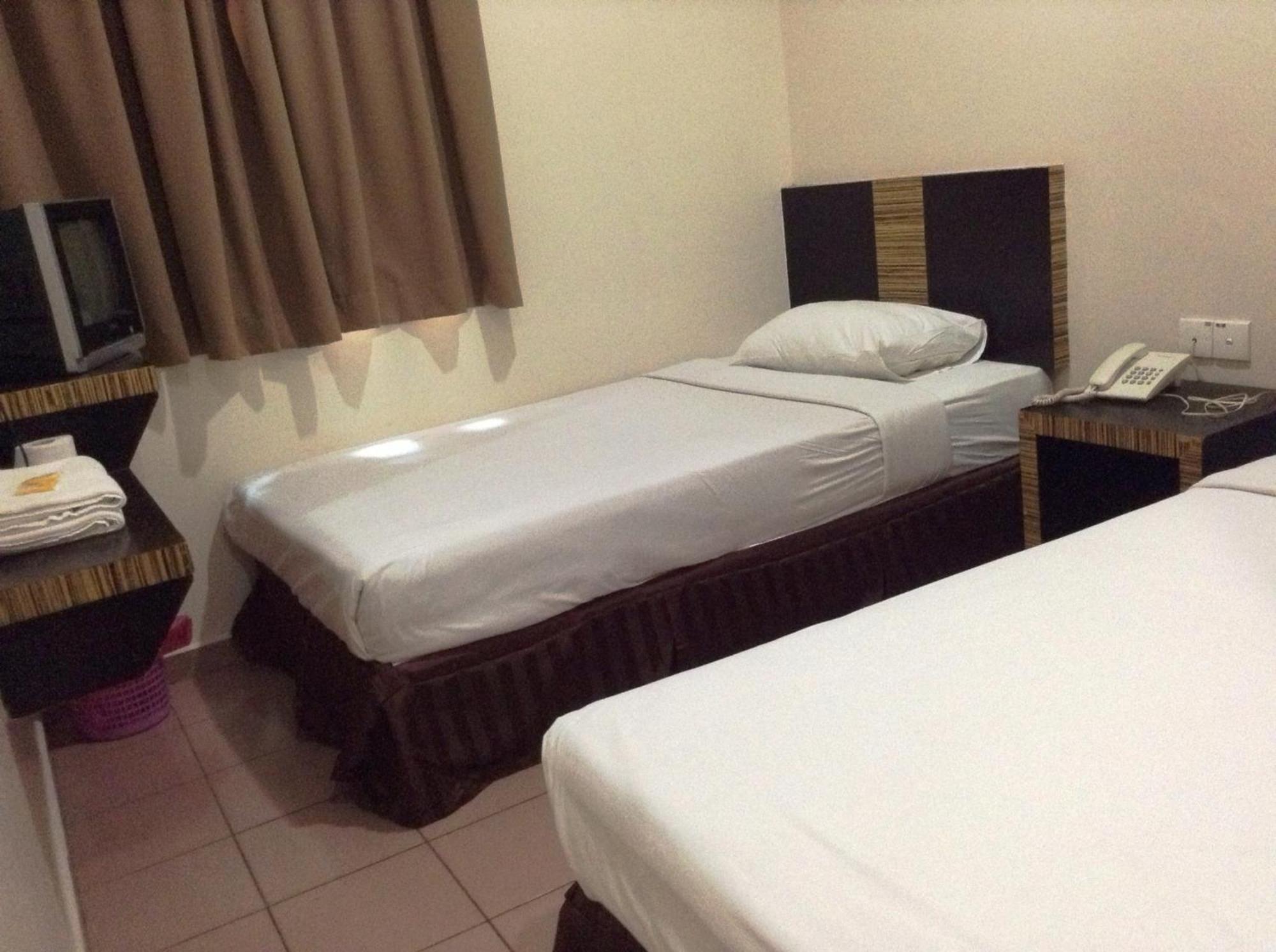 Hotel Traveller Kota Kinabalu Rom bilde